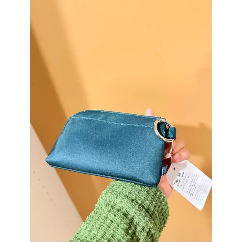 lululemon athletica Mini Zip Pouch wristlet card wallet sporty travel teal